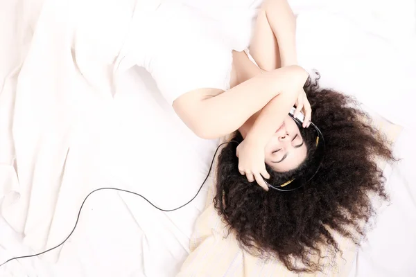 Bedtime Music	 for a young woman — Stock Photo, Image